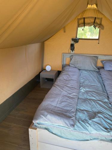 เตียงในห้องที่ Camping WakePark