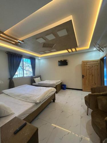 Postel nebo postele na pokoji v ubytování Murree Hotel Askari Lodges