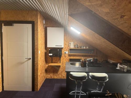 Kuchyň nebo kuchyňský kout v ubytování The Loft