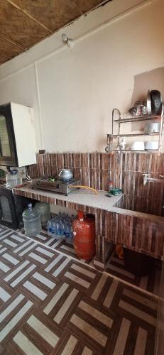 Køkken eller tekøkken på Atmaja The Cottage Garden Under Tourism Department Government of West Bengal