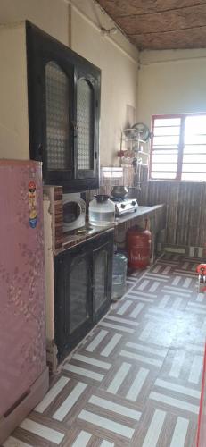 Køkken eller tekøkken på Atmaja The Cottage Garden Under Tourism Department Government of West Bengal