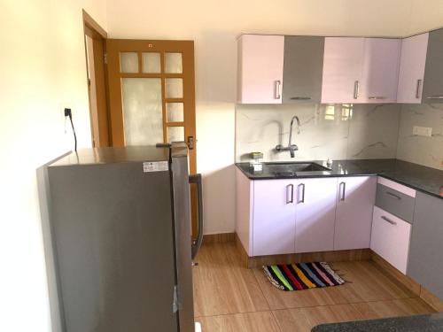 Køkken eller tekøkken på The white luxury Homestay