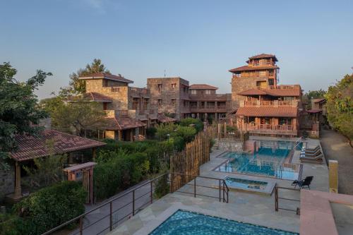 an aerial view of a resort with two swimming pools at SeraiBagh Resort in Khilchipur