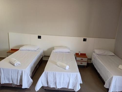 Letto o letti in una camera di Hotel Tamboril