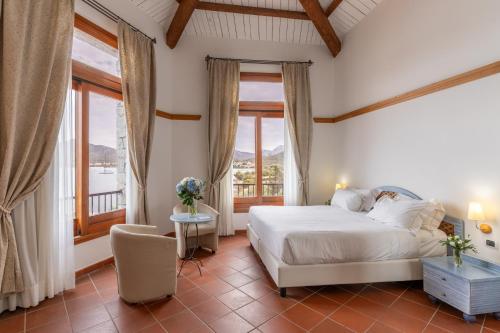 Postel nebo postele na pokoji v ubytování Hotel Palumbalza Porto Rotondo