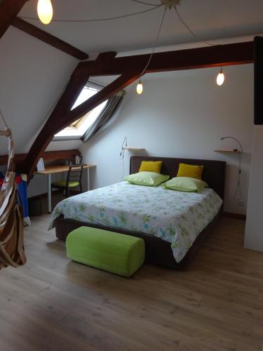 Ліжко або ліжка в номері Chambres d'hôtes Les Capucins