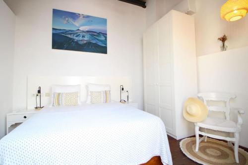 En eller flere senge i et værelse på Casa Trast