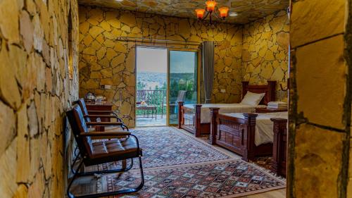 Postel nebo postele na pokoji v ubytování jabal shams view stay نزل إطلالة جبل شمس