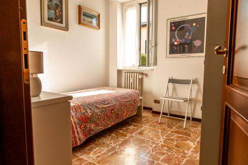 Postel nebo postele na pokoji v ubytování Quiet apartment near Como Lake - Casa Plinio