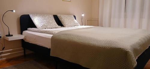 Postel nebo postele na pokoji v ubytování Apartman Rada