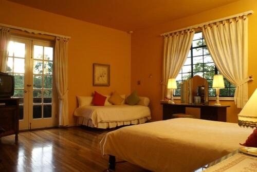 Postel nebo postele na pokoji v ubytování El Refugio Hotel & Spa