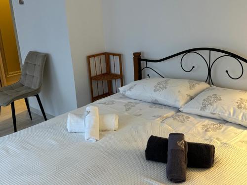 Ένα ή περισσότερα κρεβάτια σε δωμάτιο στο Vecpilsētas apartaments