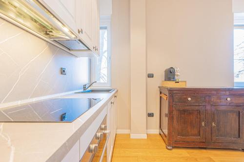 Køkken eller tekøkken på vicino alla stazione, Brixia Apartmet