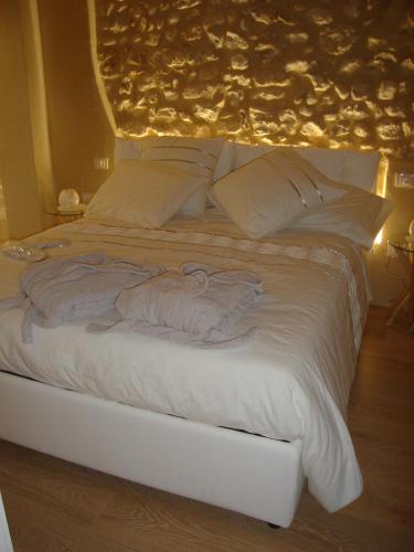 Letto o letti in una camera di Casa Daisy