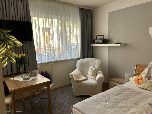 En eller flere senge i et værelse på Wohnung in Malchow