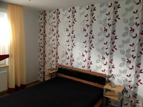 En eller flere senge i et værelse på Ferienhaus zwischen den Seen