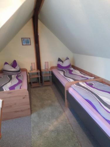 Postel nebo postele na pokoji v ubytování Ferienhaus im Spreewald