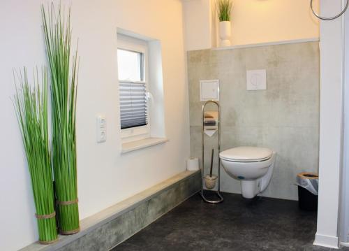 Et badeværelse på Moderne FeWo am Malchower See