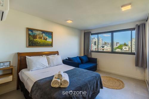 En eller flere senge i et værelse på Condomínio com lazer completo e localização imbatível em POA - BLEs