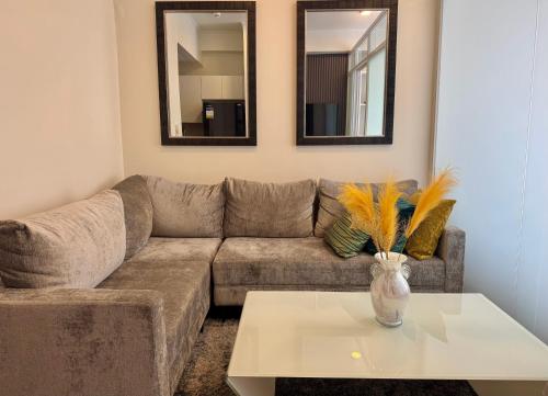Area soggiorno di Chic Units at Ivory Residences