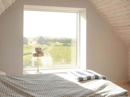 Ένα ή περισσότερα κρεβάτια σε δωμάτιο στο Renoviertes Gehöft Im Architektonischen Stil