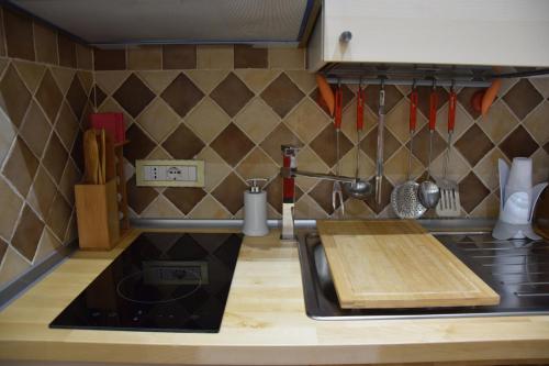 a kitchen with a sink and a counter top at Apartment n3 in City Centre in Rome