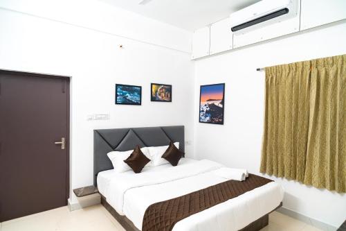 Postel nebo postele na pokoji v ubytování Le Predhu Villa