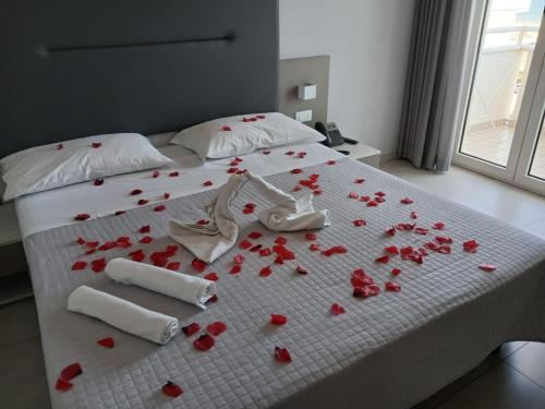 Ένα ή περισσότερα κρεβάτια σε δωμάτιο στο Nuovo Hotel SettiBi