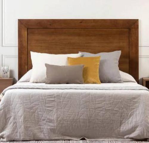 En eller flere senge i et værelse på Habitación Puerta del Carmen