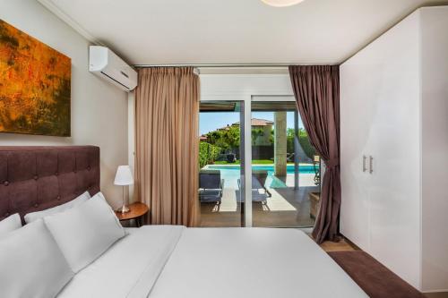 Giường trong phòng chung tại Sunny Exclusive Tria