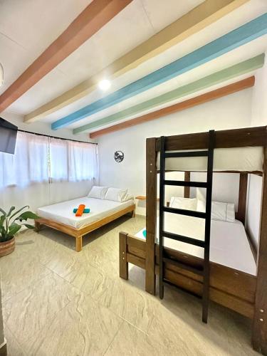 Giường trong phòng chung tại Hotel Bosque Blue