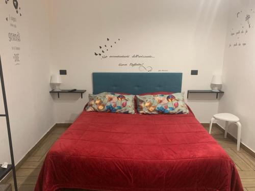 En eller flere senge i et værelse på Don Peppino