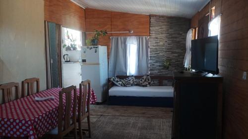 Giường trong phòng chung tại Gitana