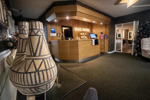 a store with a vase in the middle of a lobby at The Park Hotel - Sure Hotel Collection by Best Western in Diss