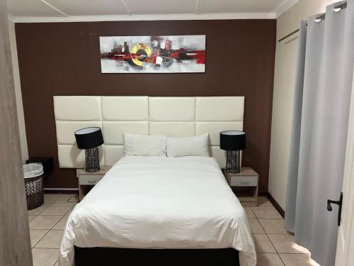 En eller flere senge i et værelse på Kimrose 1