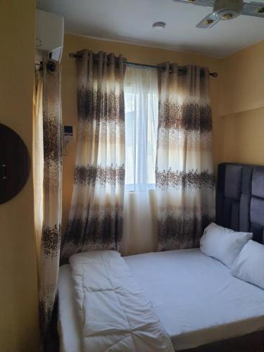 Postel nebo postele na pokoji v ubytování E&V APARTMENT Berger Express