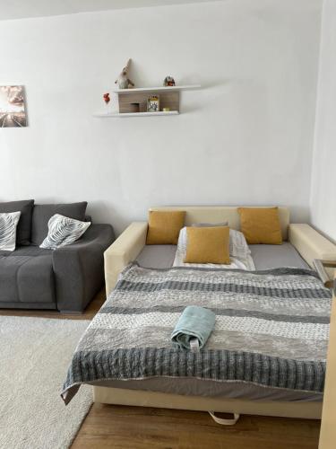 Postel nebo postele na pokoji v ubytování Small Apartman