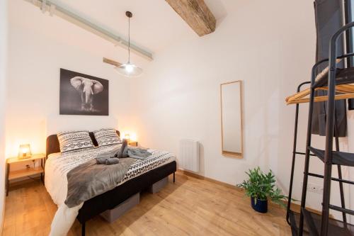 Postel nebo postele na pokoji v ubytování T2 cosy au cœur de Mâcon !