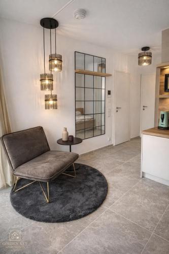 Posezení v ubytování Modernes Apartment mit Balkon und Tiefgarage Toplage Paderborn