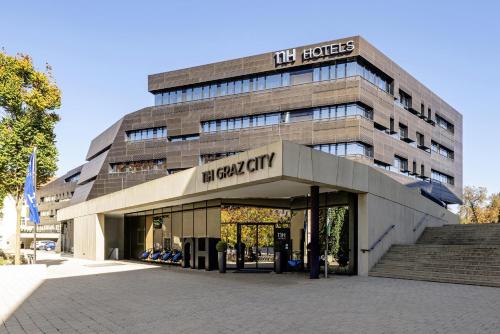 a building with a sign that reads la harvard city at NH Graz City in Graz