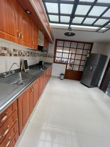 Kuchyň nebo kuchyňský kout v ubytování Otro Mundo