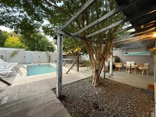 Swimmingpoolen hos eller tæt på Cabañas Los 5 Sauces