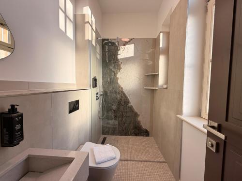 Et badeværelse på Amaroo - Apartments "Regia"