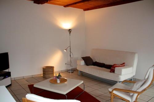 Posezení v ubytování Appartement au coeur de la nature