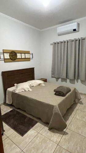 Postel nebo postele na pokoji v ubytování Casa Gêmeas 2