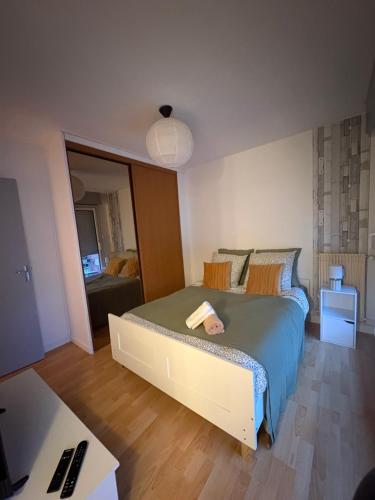 En eller flere senge i et værelse på Ma première étoile