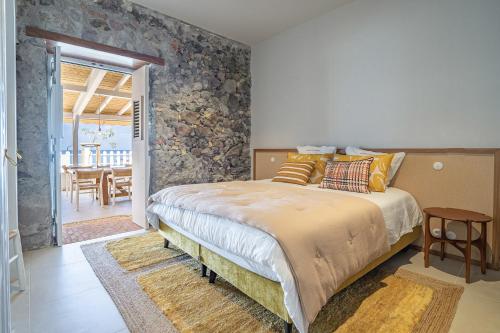 Ένα ή περισσότερα κρεβάτια σε δωμάτιο στο La Petite Maison dans la mer