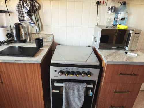 Køkken eller tekøkken på Nairobi City's Hideout