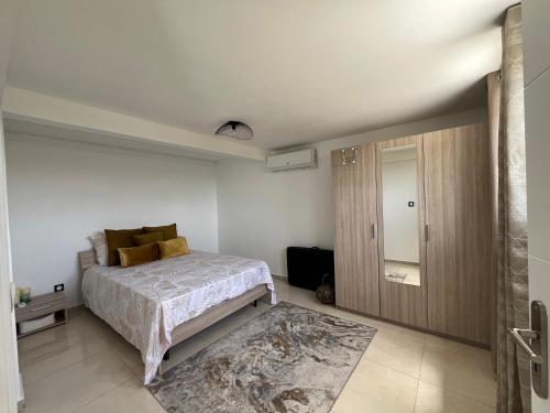 Postel nebo postele na pokoji v ubytování Entre Ciel & Mer