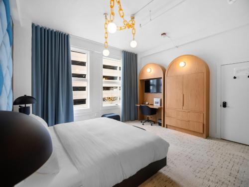 Ένα ή περισσότερα κρεβάτια σε δωμάτιο στο Symons Block Suite